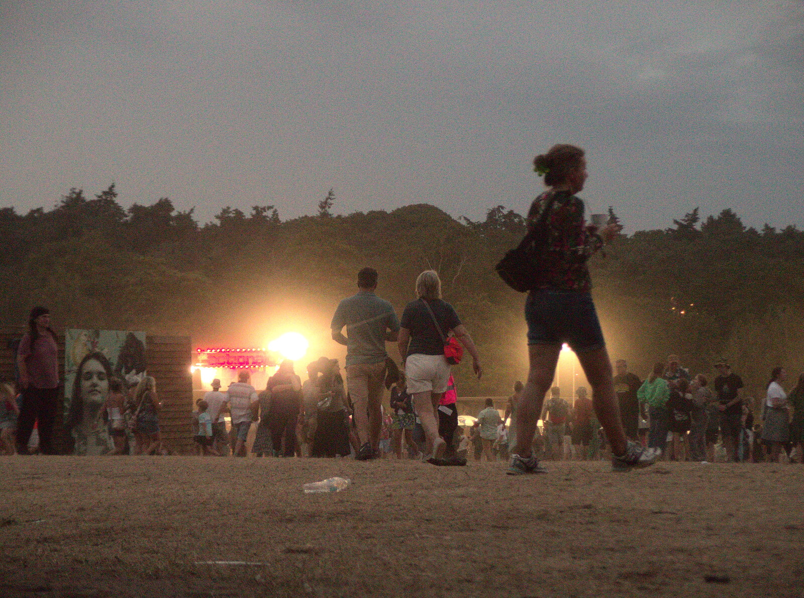 A Day at Latitude, Henham Park, Suffolk - 24th July 2022: Crowds roam around in the dusk
