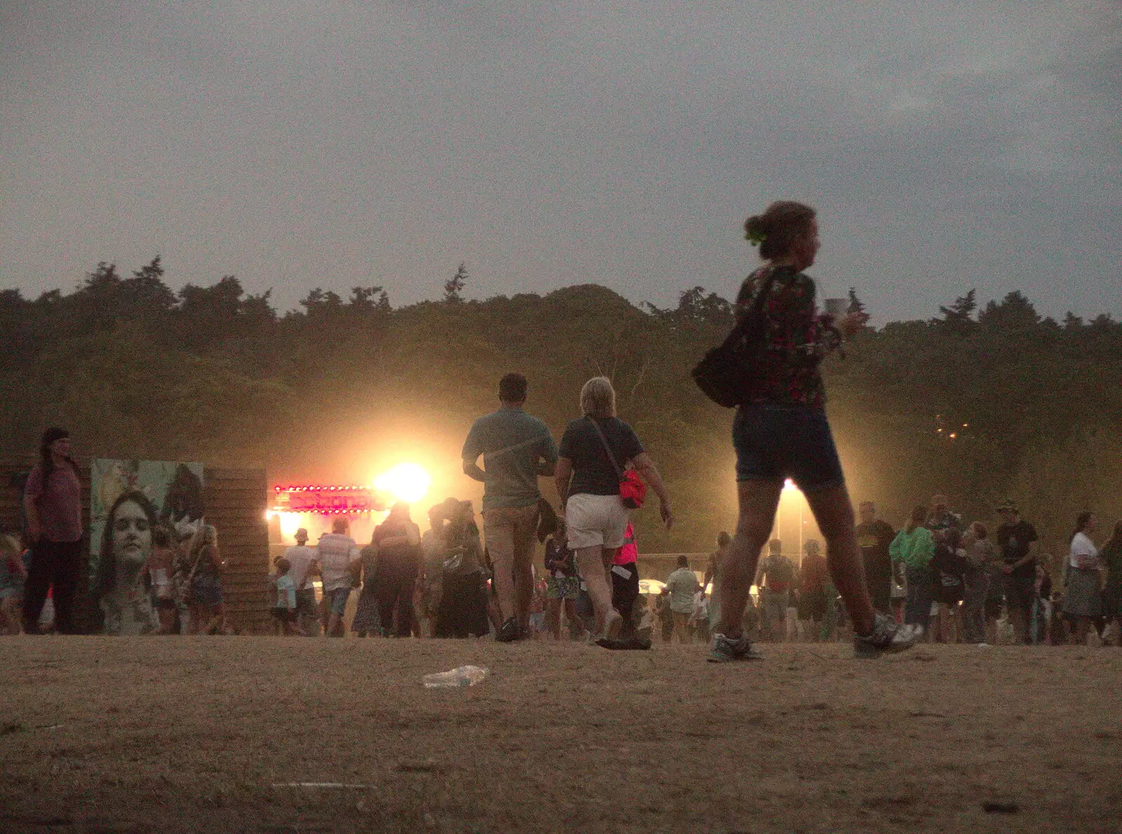 Crowds roam around in the dusk, from A Day at Latitude, Henham Park, Suffolk - 24th July 2022