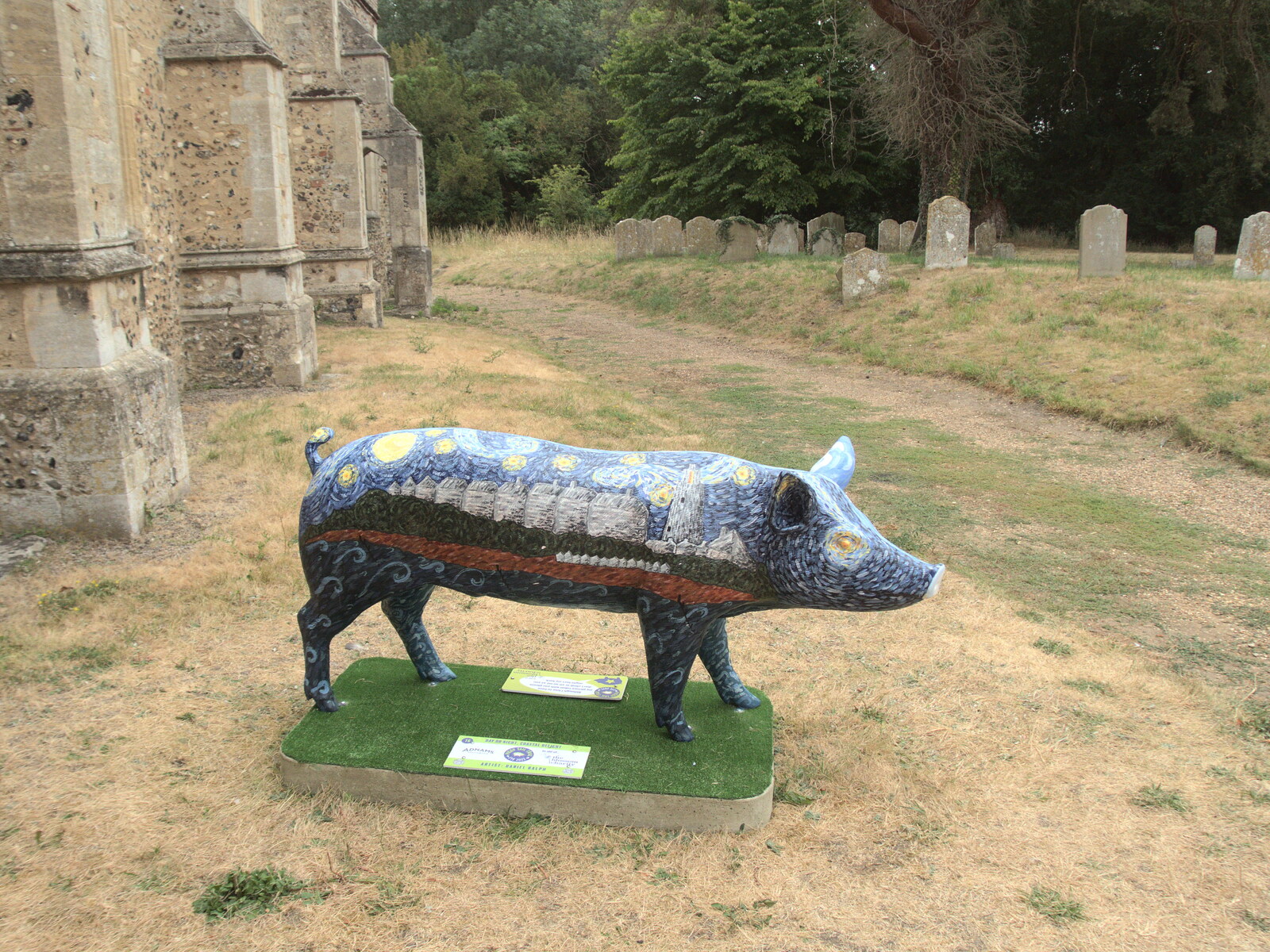 The Eye Piggy Tail Trail and Ipswich Dereliction, Suffolk - 29th July 2022: A pig in the style of Van Gogh's starry night 