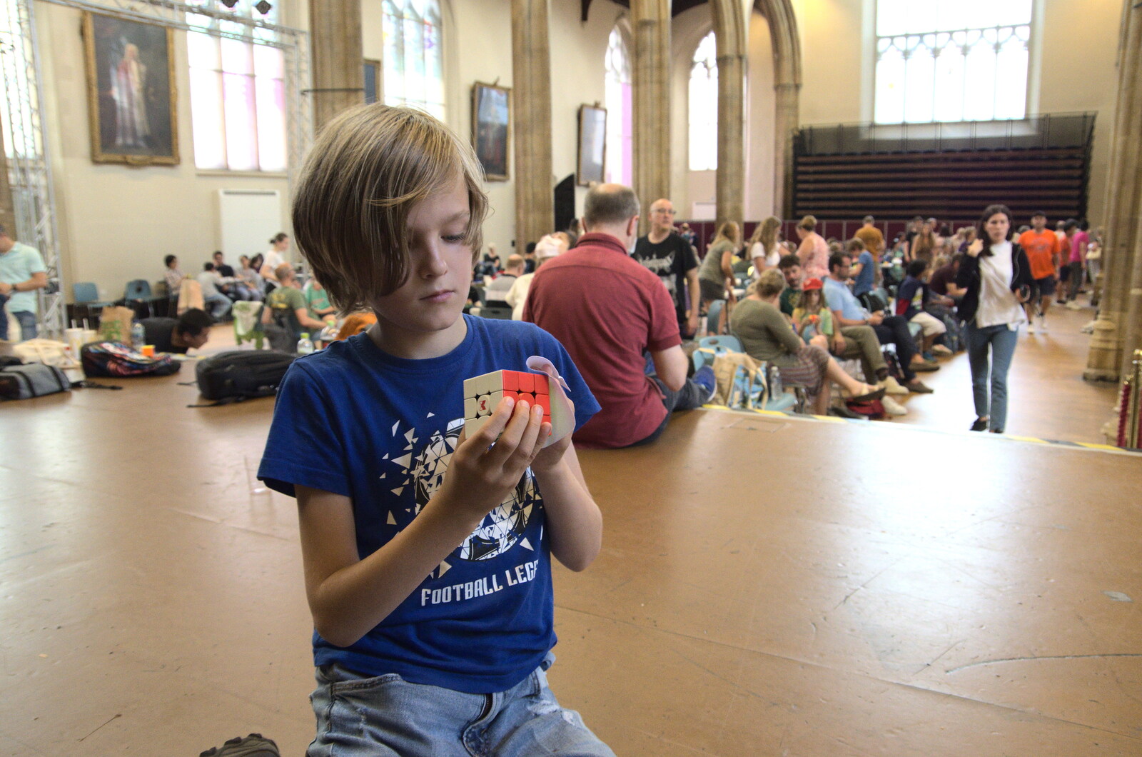 The World Cube Association Rubik's Competition, St. Andrew's Hall, Norwich - 31st July 2022: Harry's doing a 3x3 on the stage