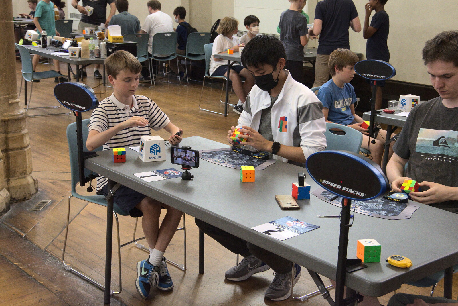 The World Cube Association Rubik's Competition, St. Andrew's Hall, Norwich - 31st July 2022: Ryan Wu works on another 6-second solve