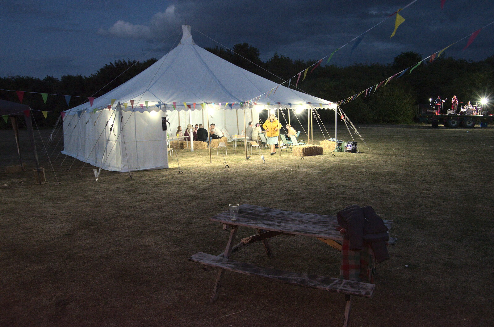 Little Red Kings at Fly High Festival, Seething Airfield, Norfolk - 5th August 2022: A marquee is an oasis of light in the field