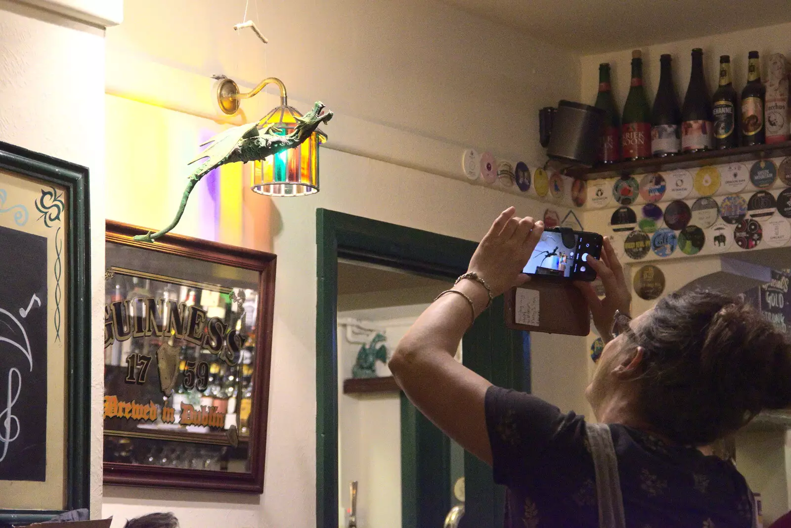 Suey takes a photo of a dangling green dragon, from Little Red Kings at Fly High Festival, Seething Airfield, Norfolk - 5th August 2022