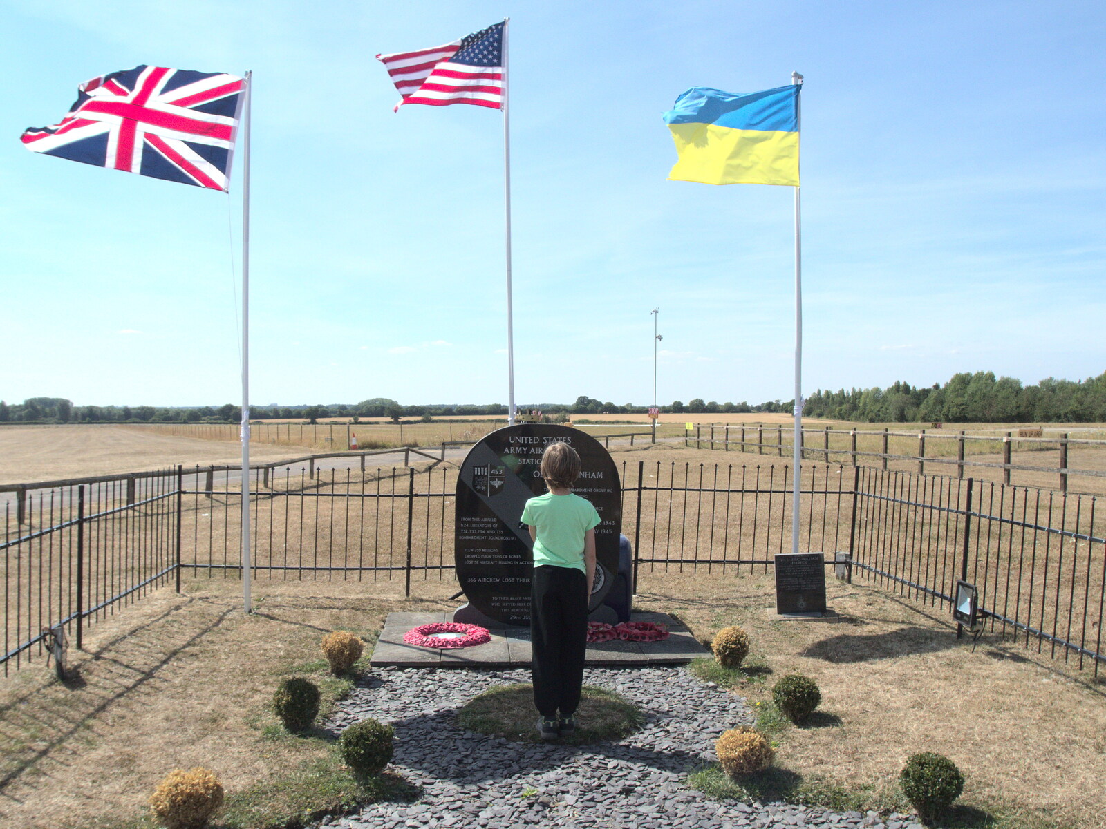 Harry looks at the war memorial from A Trip to Old Buckenham Airfield, Norfolk - 6th August 2022