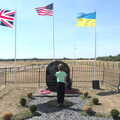 Harry looks at the war memorial, A Trip to Old Buckenham Airfield, Norfolk - 6th August 2022