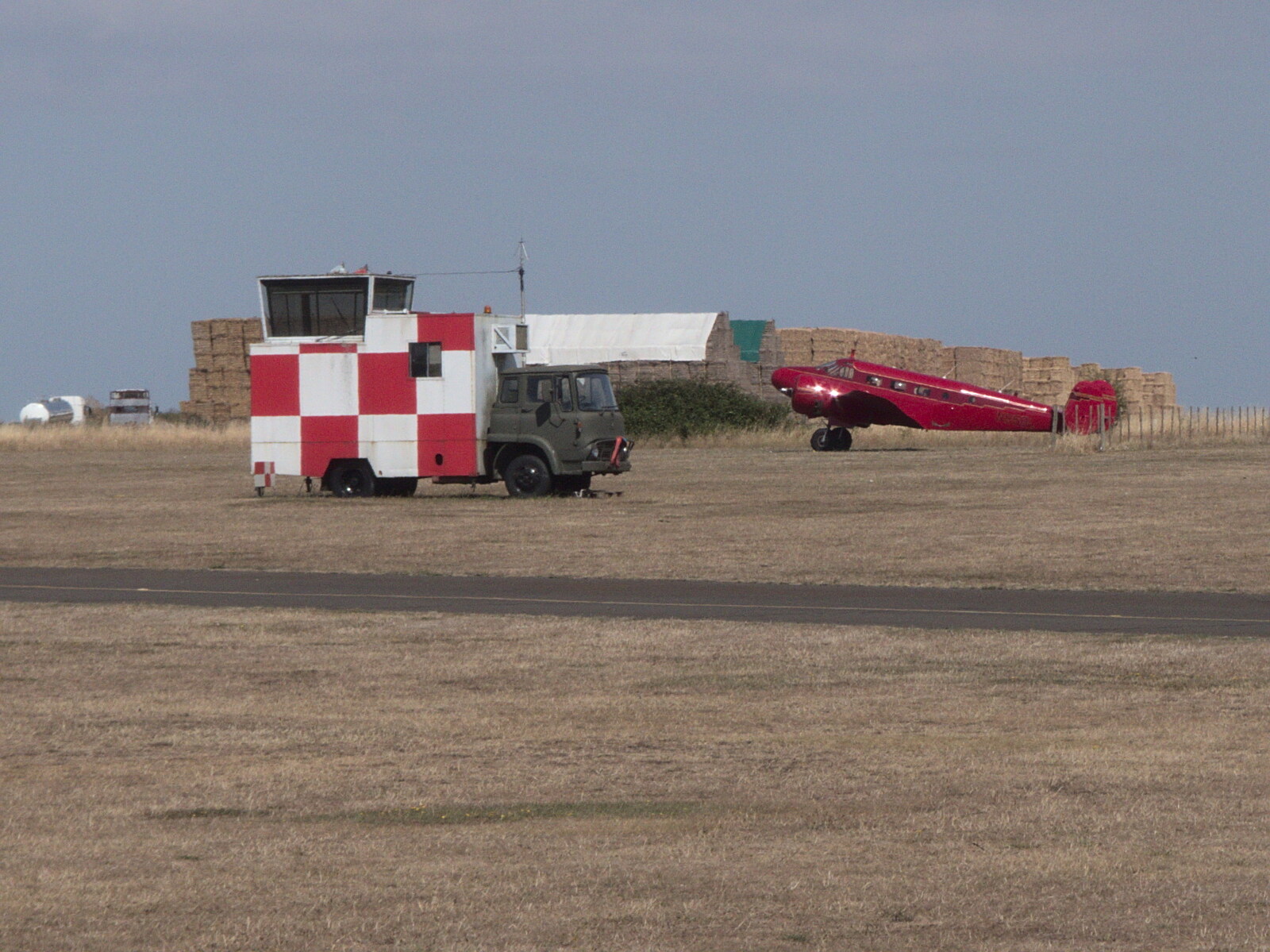 There's a nice old plane out by the mobile tower from A Trip to Old Buckenham Airfield, Norfolk - 6th August 2022