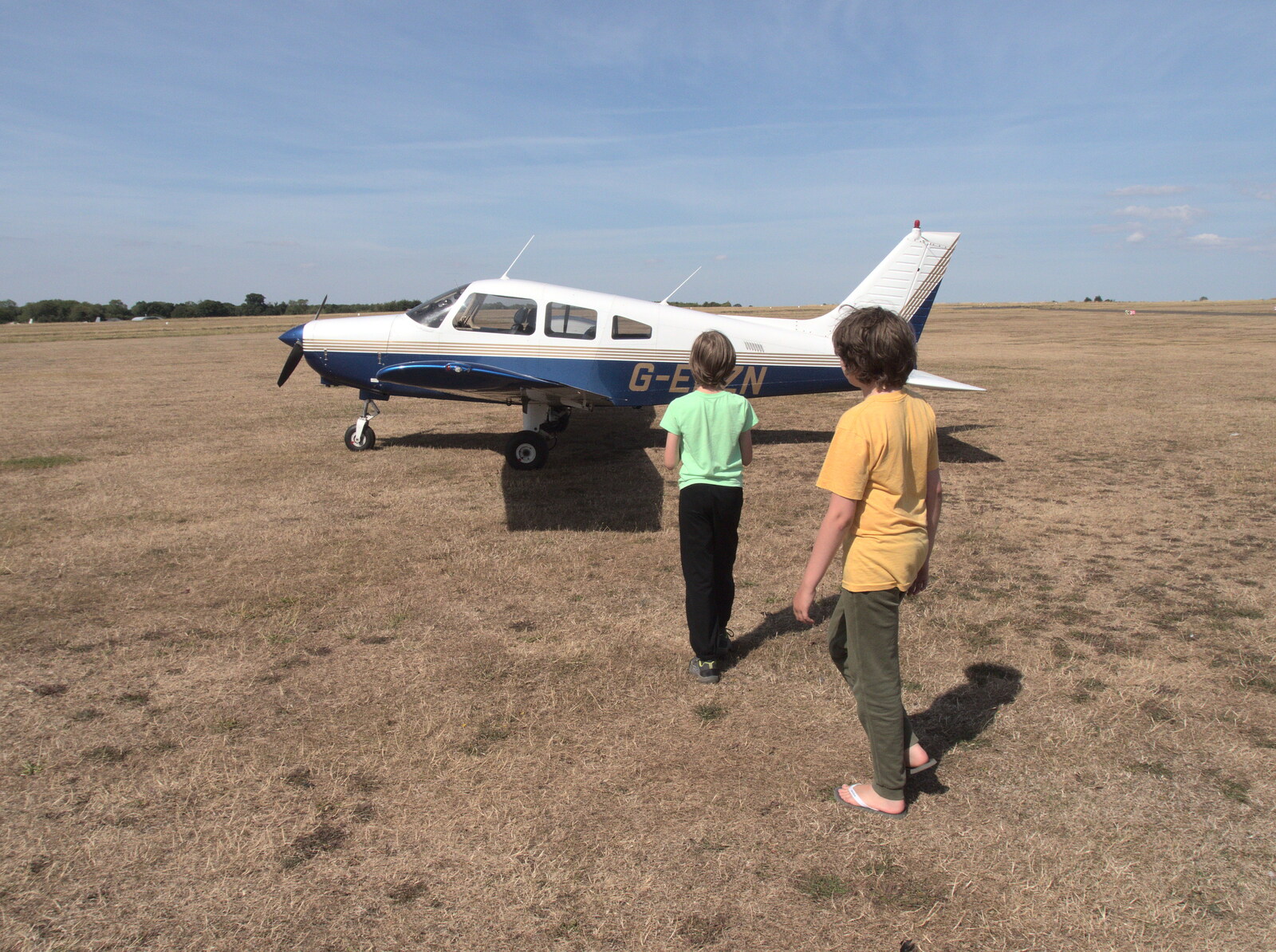 The boys head out for a look around from A Trip to Old Buckenham Airfield, Norfolk - 6th August 2022