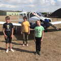 The boys pose for a photo in front of the Piper, A Trip to Old Buckenham Airfield, Norfolk - 6th August 2022
