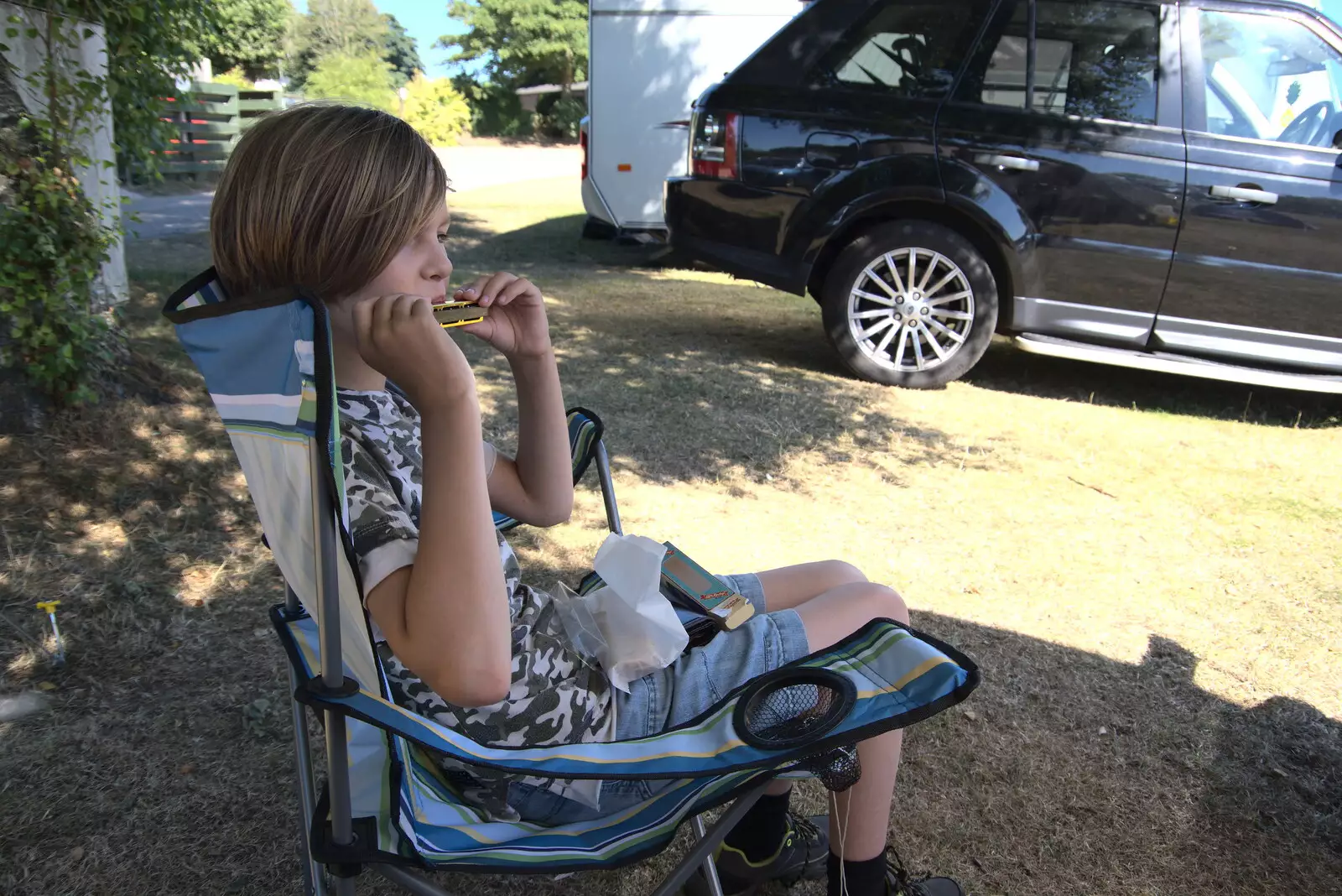 Harr plays his new harmonica, from Camping at Forest Park, Cromer, Norfolk - 12th August 2022