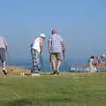 Old dudes play pitch-and-putt on the clifftop, Camping at Forest Park, Cromer, Norfolk - 12th August 2022