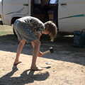 Camping at Forest Park, Cromer, Norfolk - 12th August 2022, Harry 'helps' by bashing up an empty can