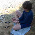 Camping at Forest Park, Cromer, Norfolk - 12th August 2022, Fred shows off his collection of Belemnites
