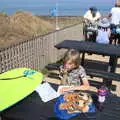 Harry licks his fingers after a bag of donuts, Camping at Forest Park, Cromer, Norfolk - 12th August 2022