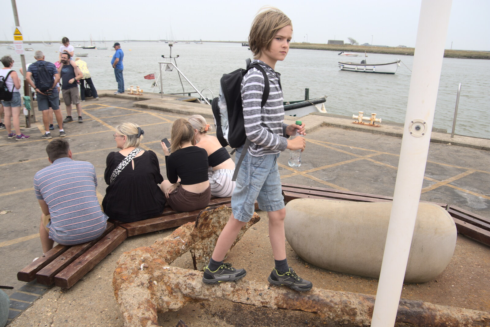 Harry stands on a rust anchor from A Trip to Orford Ness, Orford, Suffolk - 16th August 2022