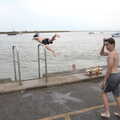 A Trip to Orford Ness, Orford, Suffolk - 16th August 2022, Boys hurl themselves into the River Ore