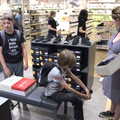 A Norwich Trip, and Rob Folkard and Jo at The Bank, Eye, Suffolk - 20th August 2022, The boys try on shoes in Deichmann