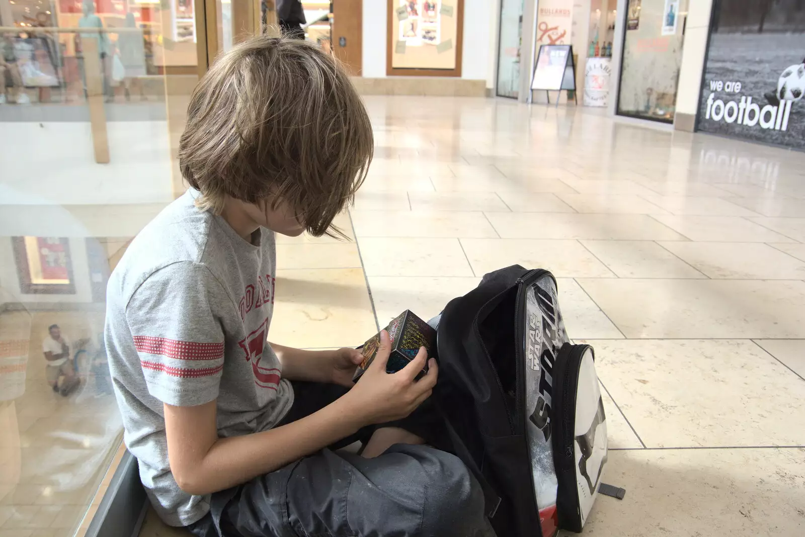 Harry checks out a new box of Pokémon or something, from A Norwich Trip, and Rob Folkard and Jo at The Bank, Eye, Suffolk - 20th August 2022