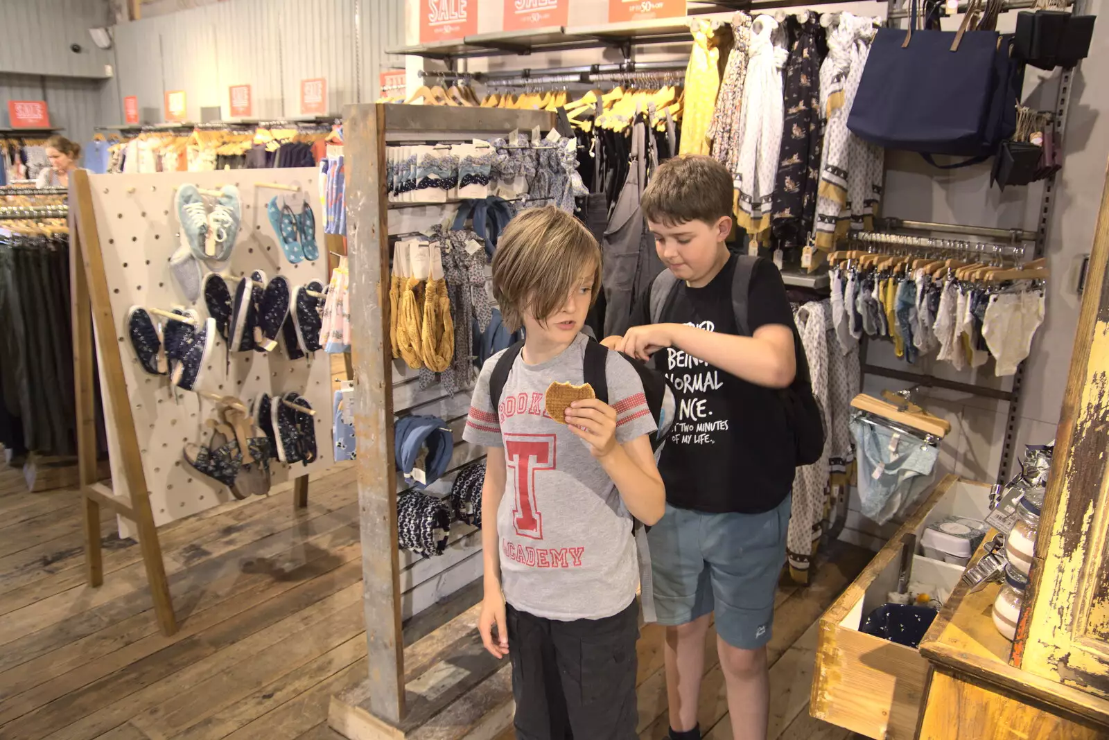 The boys are in another clothes shop, from A Norwich Trip, and Rob Folkard and Jo at The Bank, Eye, Suffolk - 20th August 2022