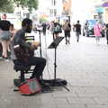A Norwich Trip, and Rob Folkard and Jo at The Bank, Eye, Suffolk - 20th August 2022, A busker does his thing on Gentleman's Walk