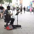 A busker does his thing on Gentleman's Walk, A Norwich Trip, and Rob Folkard and Jo at The Bank, Eye, Suffolk - 20th August 2022