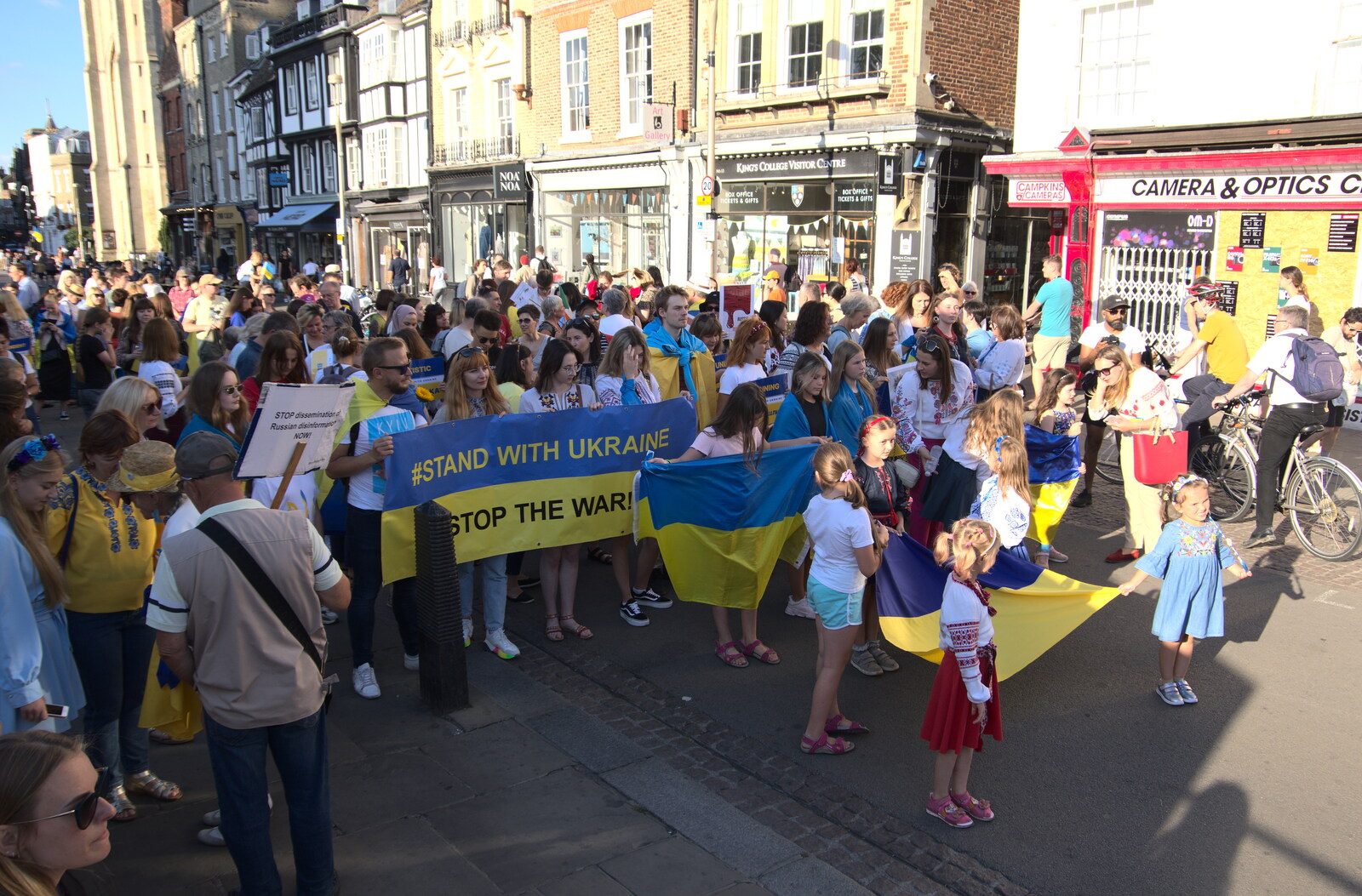 The demo mills around on King's Parade from Anglesey Abbey and a #StandWithUkraine Demo, Cambridge - 24th August 2022