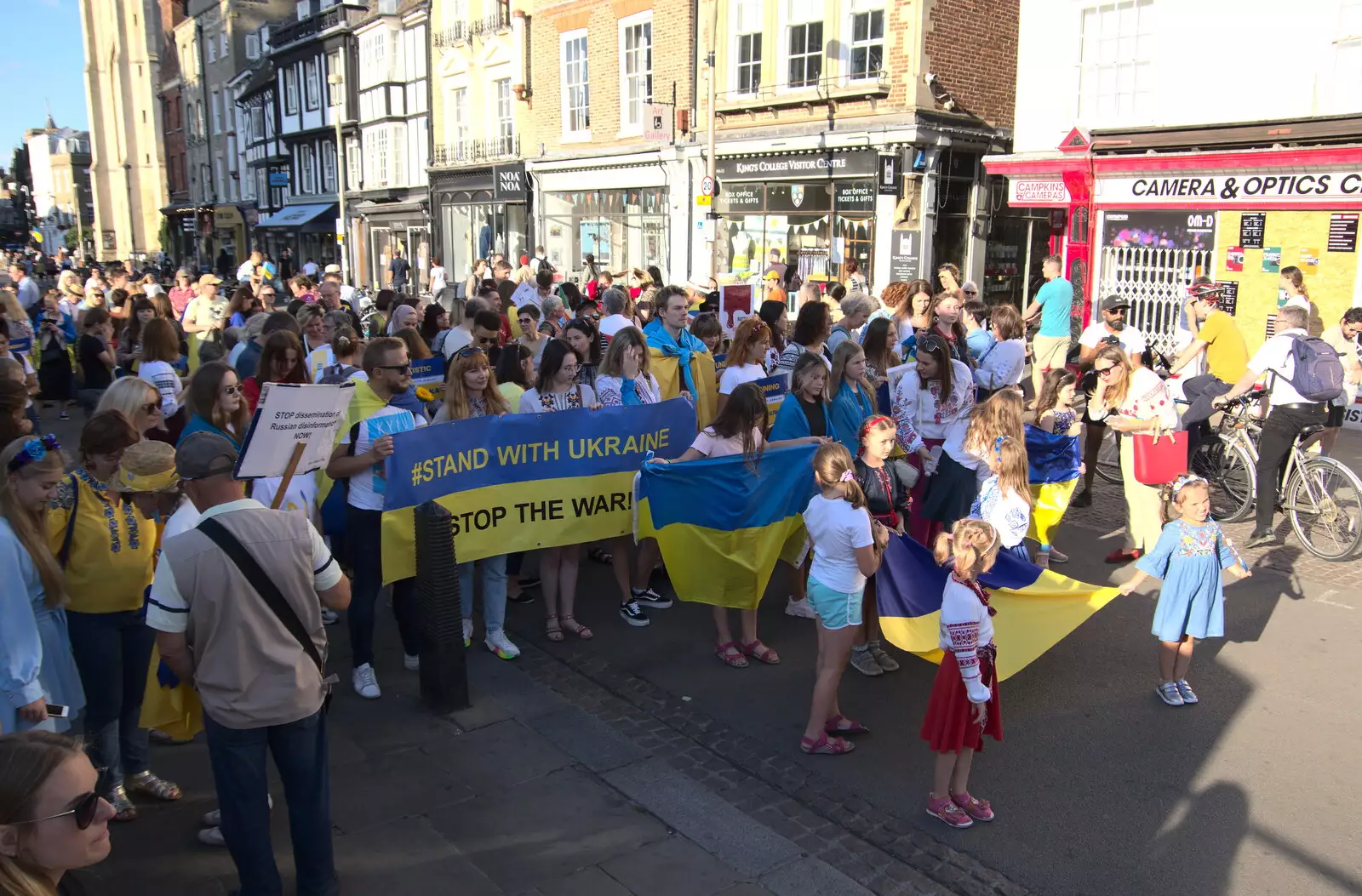 The demo mills around on King's Parade, from Anglesey Abbey and a #StandWithUkraine Demo, Cambridge - 24th August 2022