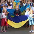 Girls in national dress hold a Ukrainian flag, Anglesey Abbey and a #StandWithUkraine Demo, Cambridge - 24th August 2022