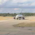 A broken-down 737 Max is towed off the taxiway, The Flags of Arezzo, Tuscany, Italy - 28th August 2022