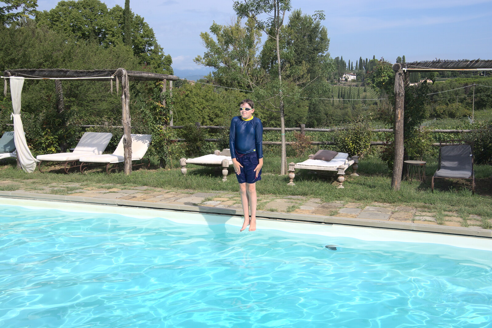 The Flags of Arezzo, Tuscany, Italy - 28th August 2022: Fred jumps into the pool