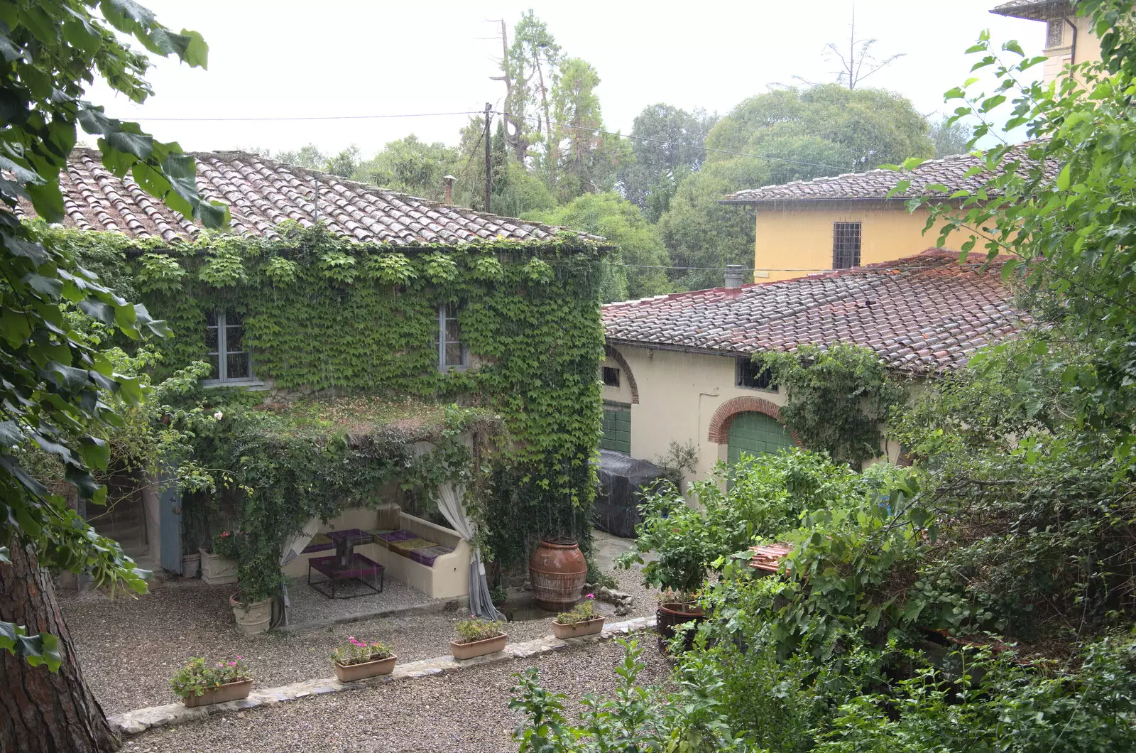 There's a brief, but heavy, rain shower, from The Flags of Arezzo, Tuscany, Italy - 28th August 2022