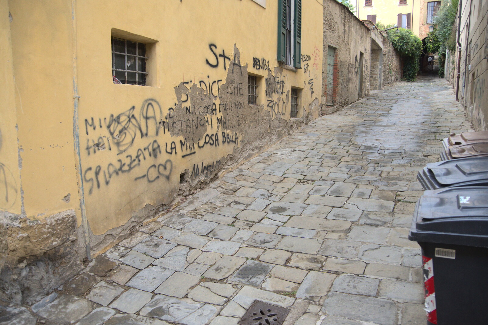 The Flags of Arezzo, Tuscany, Italy - 28th August 2022: Graffiti on an Arezzo side street