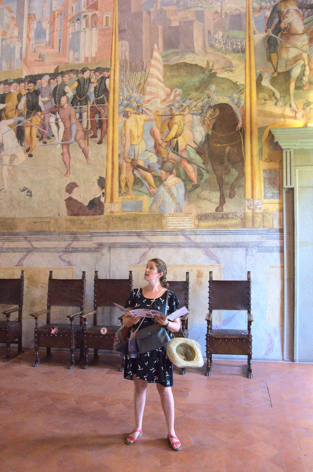 Castiglio Del Lago and Santuario della Verna, Umbria and Tuscany, Italy - 1st September 2022: Isobel looks at paintings