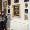 A Heritage Open Day, Eye, Suffolk - 18th September 2022, A couple look at paintings on the wall