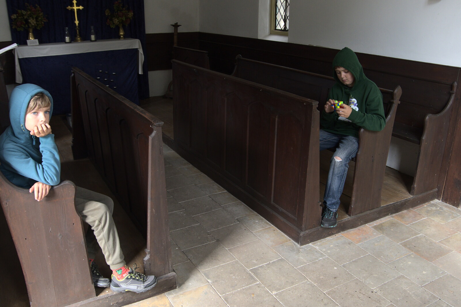 Harry's bored as Fred cubes in a pew from A Heritage Open Day, Eye, Suffolk - 18th September 2022