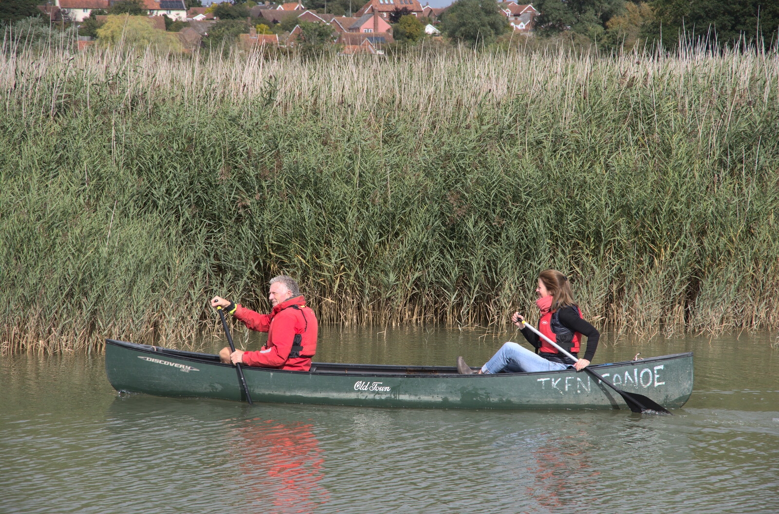 A couple canoe up the river from The Aldeburgh Food Festival, Snape Maltings, Suffolk - 25th September 2022