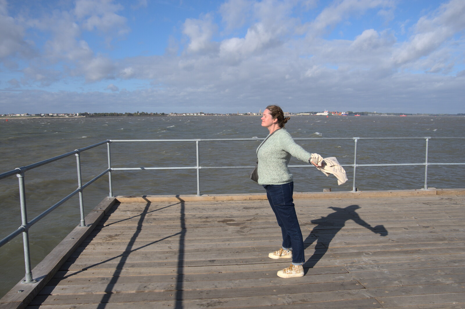 A Postcard from Felixstowe, Suffolk - 5th October 2022: Isobel leans into the wind