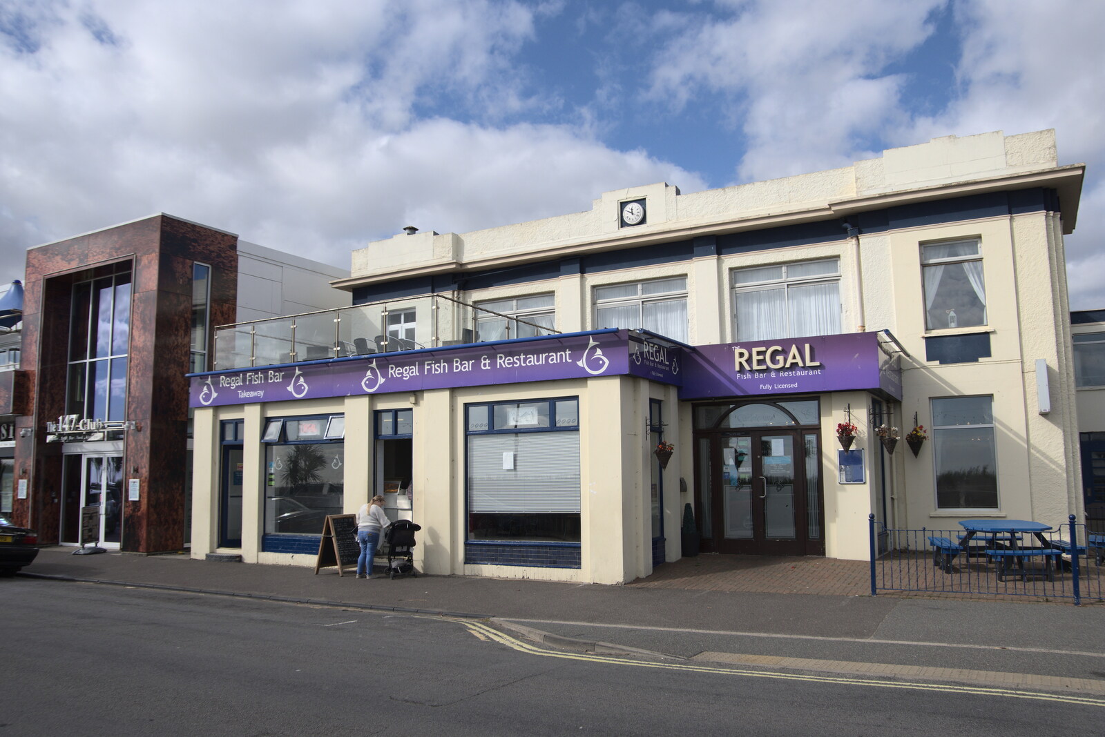 A Postcard from Felixstowe, Suffolk - 5th October 2022: The 1930s Regal fish bar's clock is actually right