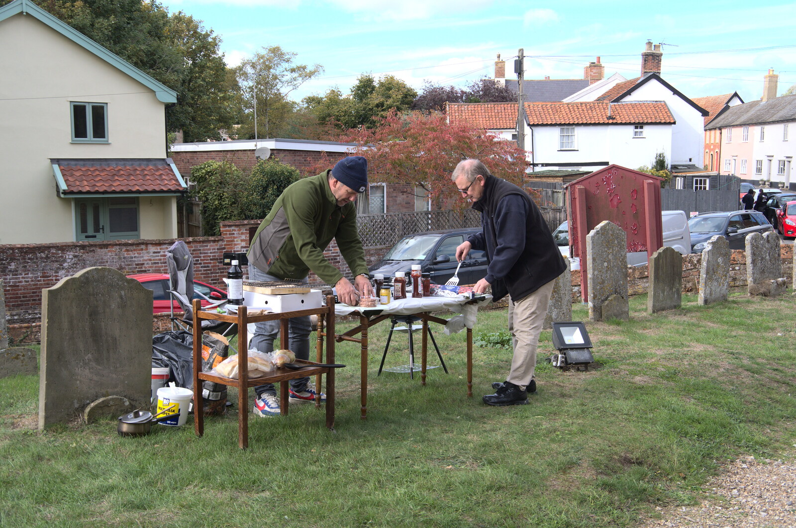 Dudes outside are doing a barbeque from A Golf Club Quiz and a Church Fête, Eye, Suffolk - 15th October 2022