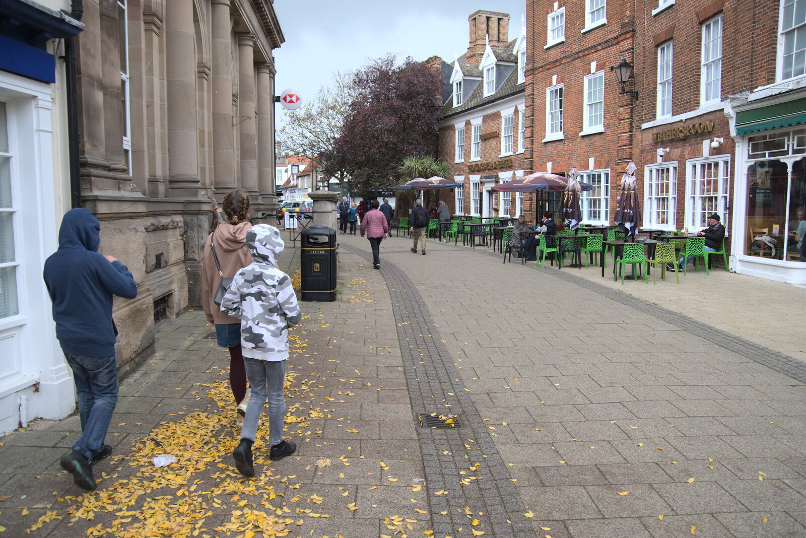 An Afternoon in Beccles, Suffolk - 26th October 2022: Golden leaves blow around on Sheepgate