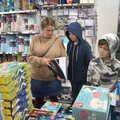 Isobel and the boys look at books in WHSmith, An Afternoon in Beccles, Suffolk - 26th October 2022