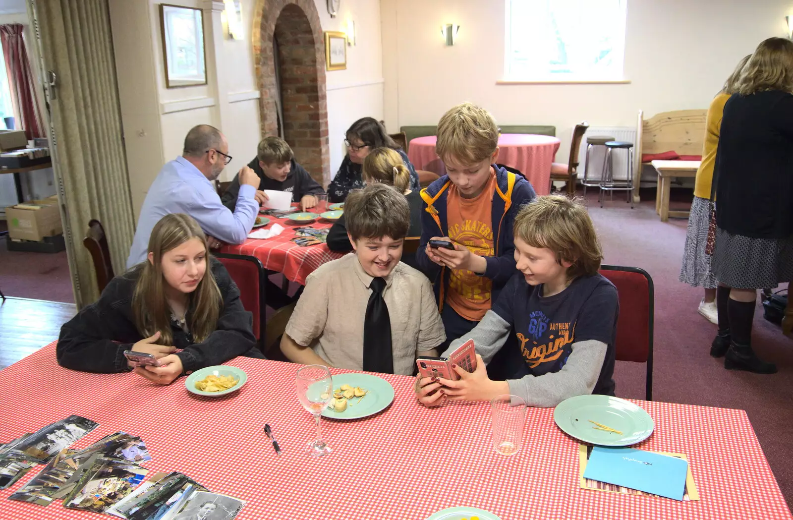 Oak shows off something on his phone, from Grandad's Memorial Do, The Village Hall, Brome, Suffolk - 28th October 2022