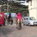 The two horses head off behind the chip van, Pizza and Pasta in Bury St. Edmunds, Suffolk - 30th October 2022