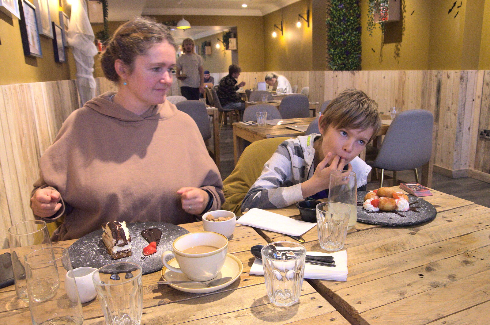 Pizza and Pasta in Bury St. Edmunds, Suffolk - 30th October 2022: Harry gets some doughnuts with strawberries