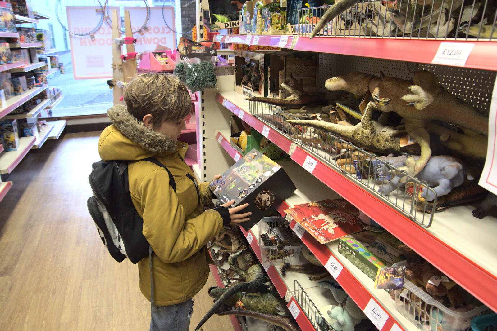 Pizza and Pasta in Bury St. Edmunds, Suffolk - 30th October 2022: Harry checks out bargains in the Toymaster sale