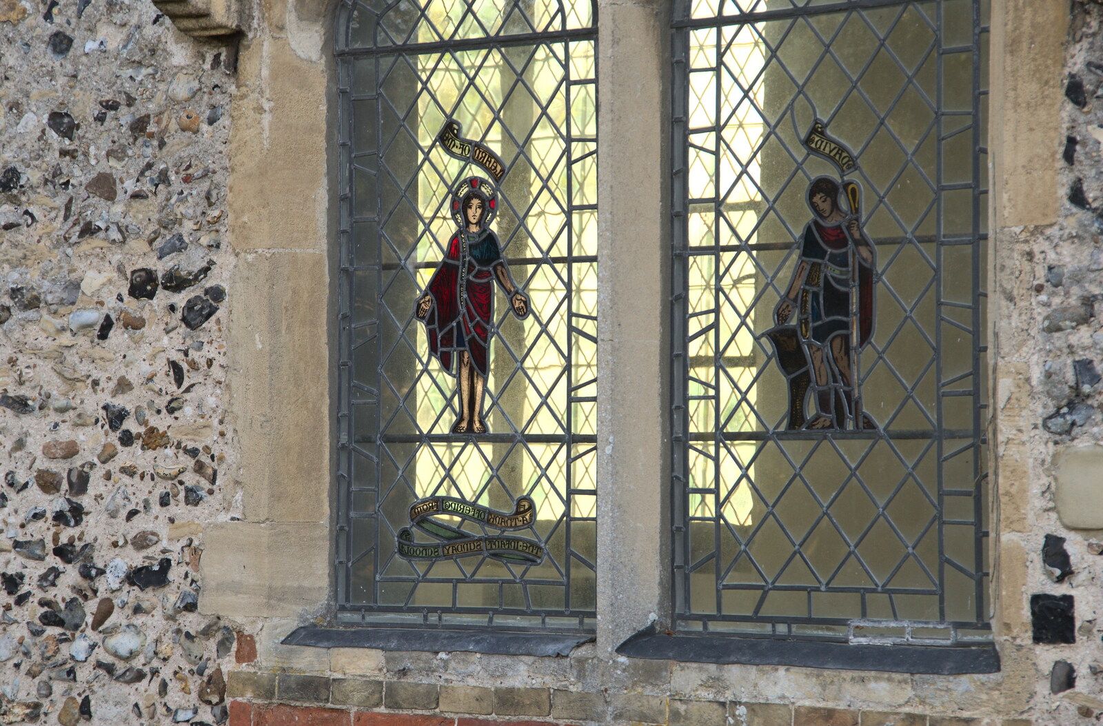A Postcard from Bungay, Suffolk - 2nd November 2022: Older stained glass in the Saxon church 