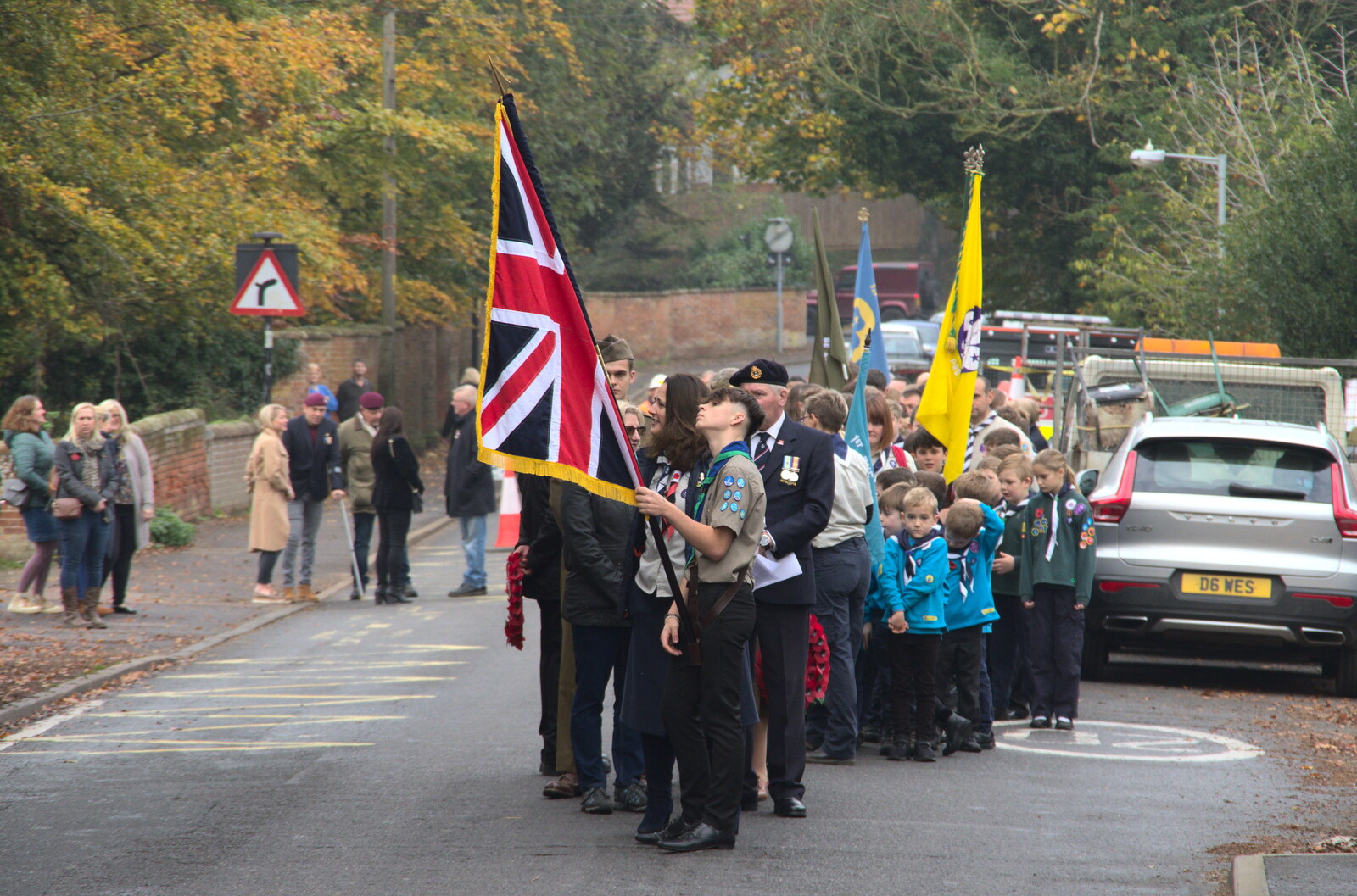 The Scouts' Remembrance Day Parade, Eye, Suffolk - 13th November 2022: Beavers, Cubs and Scouts pile up behind the flag