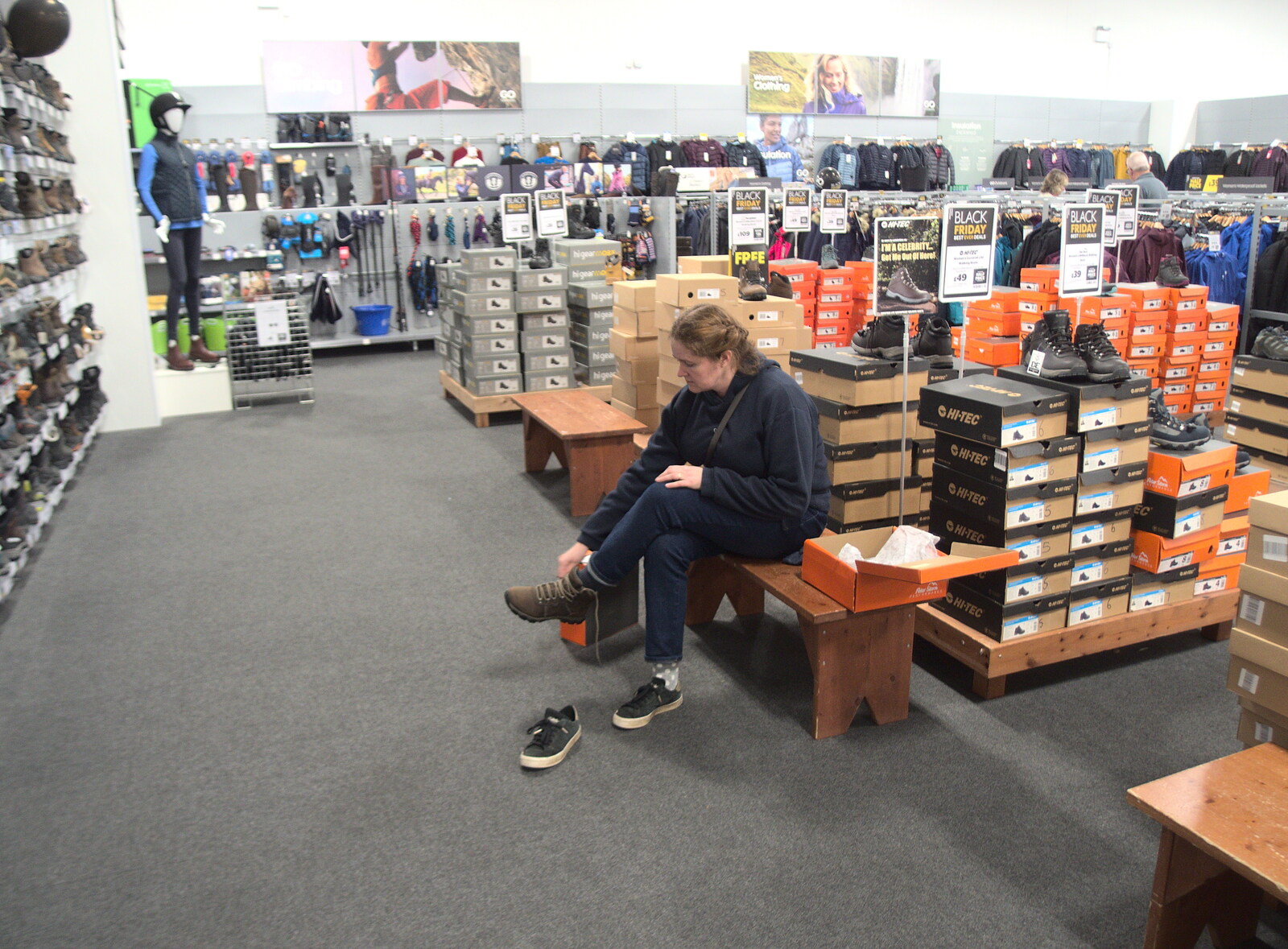 Isobel tries some shoes on in Go Outdoors from Lunch in Norwich and the GSB at Gislingham, Suffolk - 26th November 2022