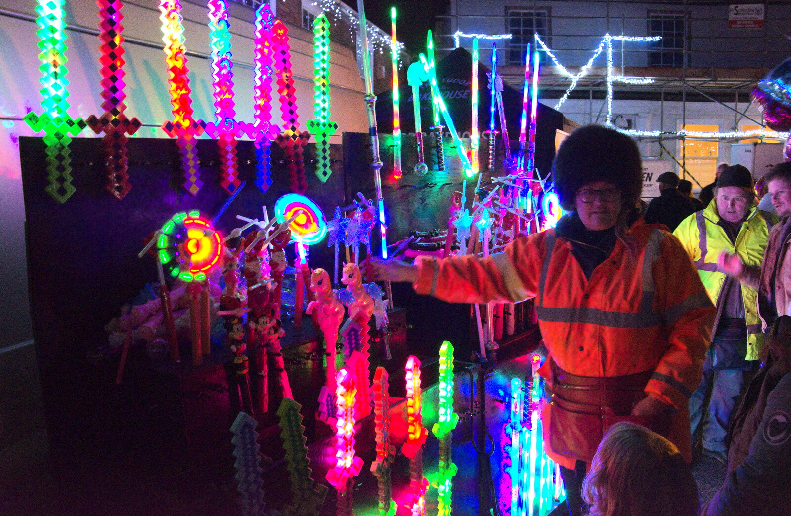A woman sells a lot of flashing-light tat from Eye Lights and the GSB at Botesdale, Suffolk - 2nd December 2022