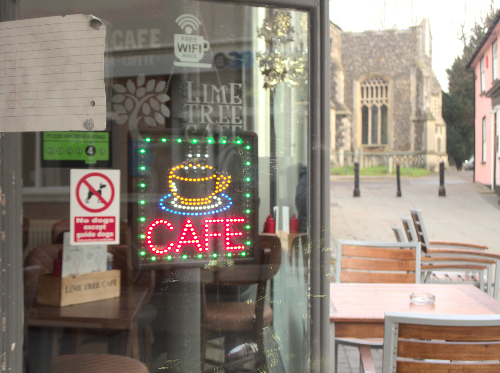 An LED café sign in the window from Dove Players do Aladdin, Eye, Suffolk - 10th December 2022