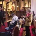 Harry eats a mince pie in Thornham church, The Gislingham Silver Band at Thornham and Yaxley, Suffolk - 19th December 2022